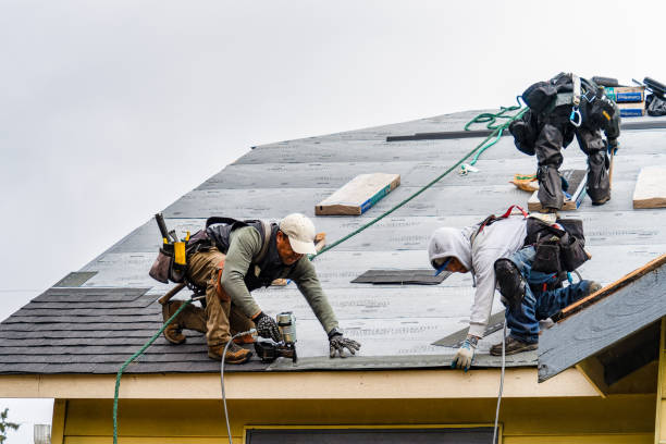 Professional Roofing technician working in East Texas, PA
